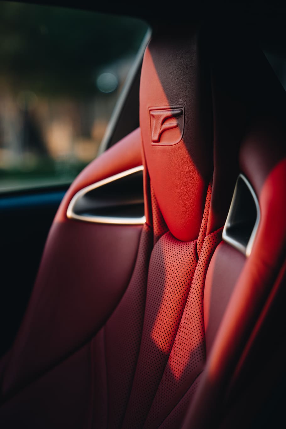 red leather car seat, person, human, people, race car, sports car