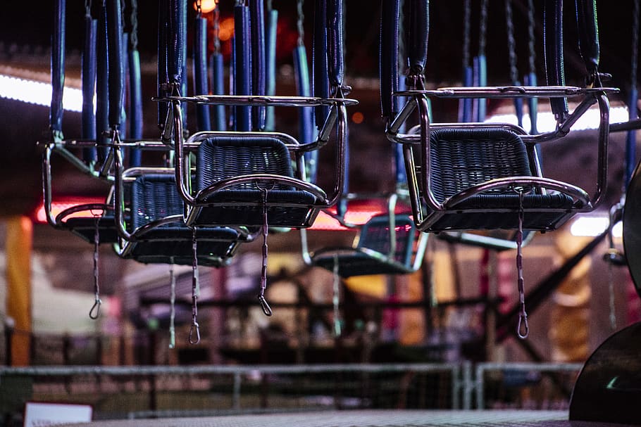 selective focus photography of gray hanging chairs, furniture