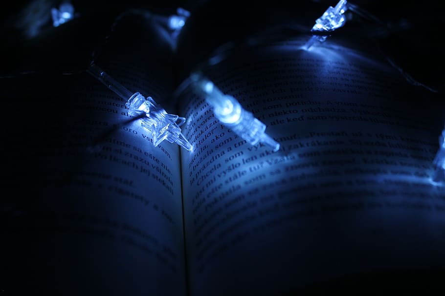 String Lights On Book, dark, illuminated, page, words, paper HD wallpaper