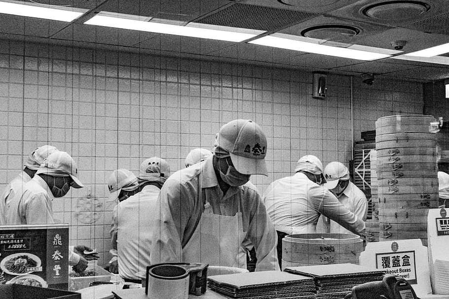 grayscale photography of workers inside room, helmet, apparel HD wallpaper