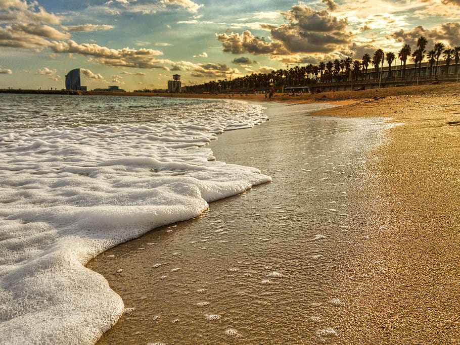 spain, barcelona, water, sky, cloud - sky, beach, beauty in nature HD wallpaper