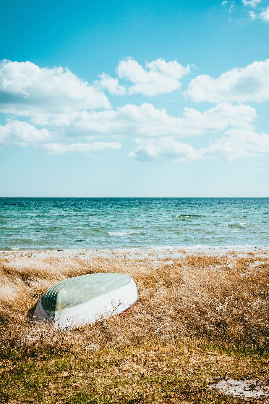HD wallpaper: boat on beach under blue sky, field, seaside, ocean, horizon  | Wallpaper Flare