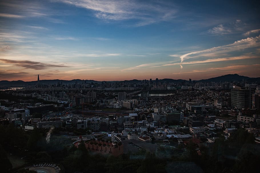 cityscape under blue sky, landscape, outdoors, nature, scenery HD wallpaper