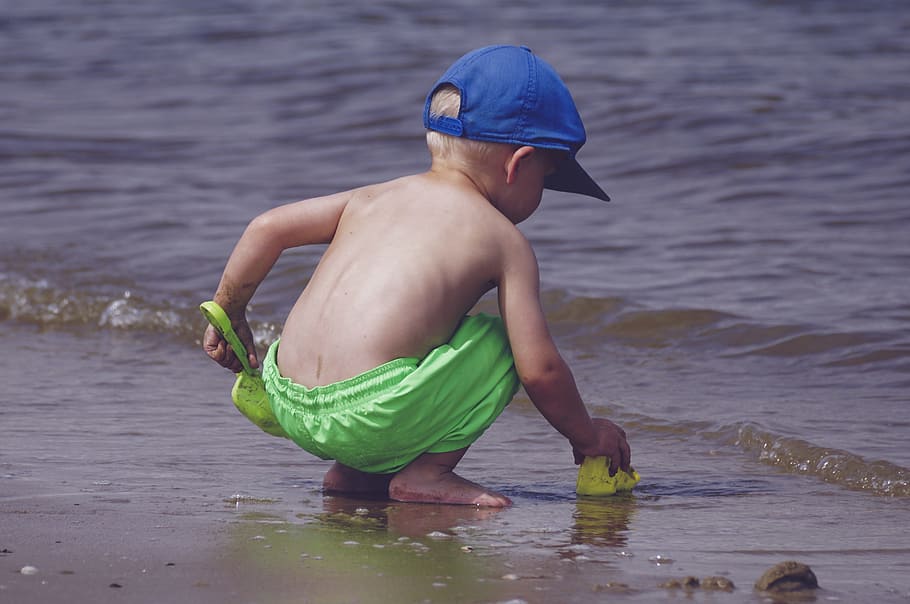 Boy In Blue Cap And Green Shorts Playing On Seashore, beach, child HD wallpaper