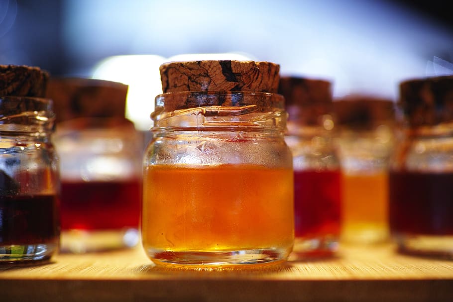 Clear Glass Vial Filled With Orange Liquid, bottles, close-up HD wallpaper