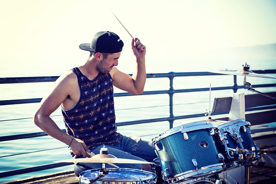 Man Playing Drum Near Bay at Day Time, busk, busker, busking HD wallpaper
