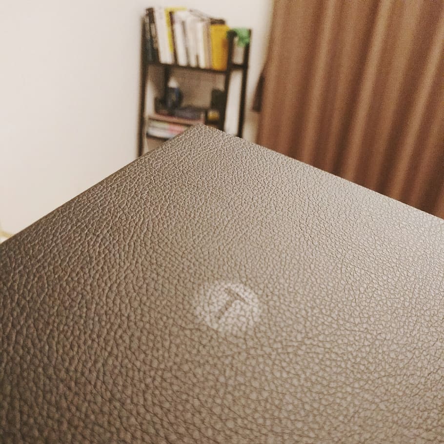 smartisan, notebook, indoors, close-up, no people, sofa, selective focus HD wallpaper