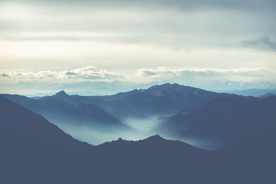 black rocky mountain under white cloudy sky, beauty in nature HD wallpaper