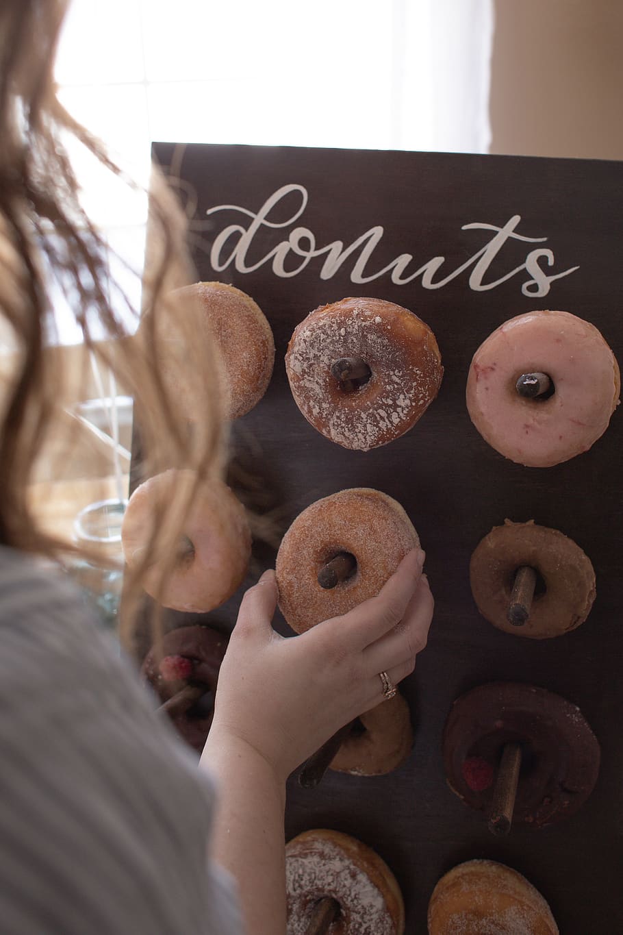 baked donuts, food and drink, one person, sweet food, indoors HD wallpaper