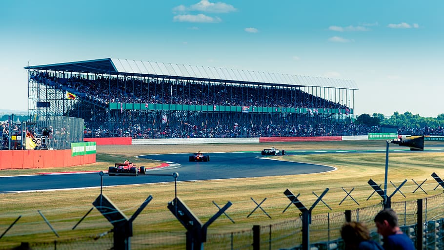 race track with on going event, sport, group of people, stadium HD wallpaper