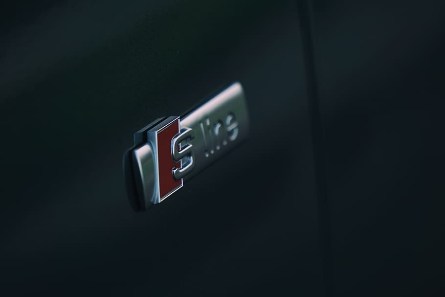black and gray emblem, indoors, technology, close-up, black background HD wallpaper
