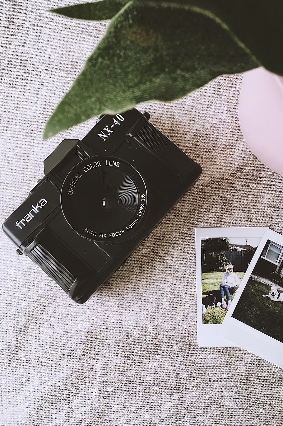Black Franka Nx-40 Camera on Grey Fabric Cloth, analog camera HD wallpaper