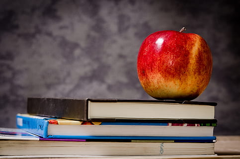 Close-up of Apple on Top of Books, blur, book stack, bright, college HD wallpaper