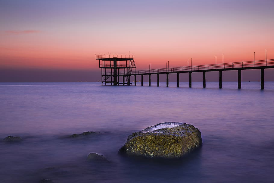 Gray Rock Near Wooden Dock, beach, boulder, bridge, dawn, evening HD wallpaper