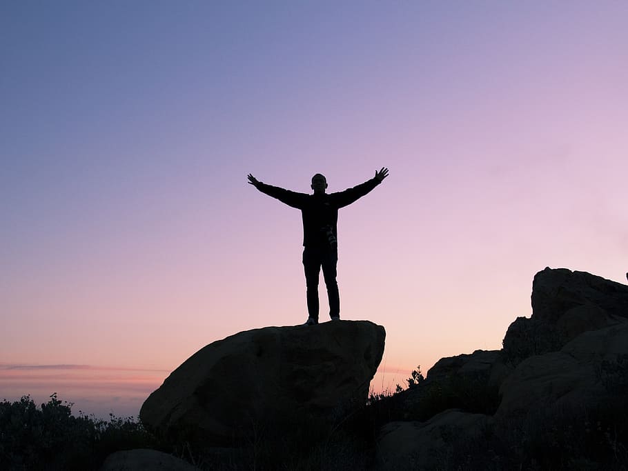 sunset, dusk, sky, purple, silhouette, man, guy, rocks, standing HD wallpaper