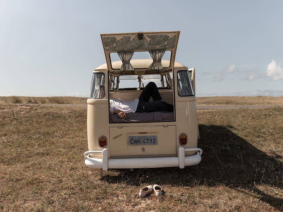 beige minivan parked in green grass field, travel, transport
