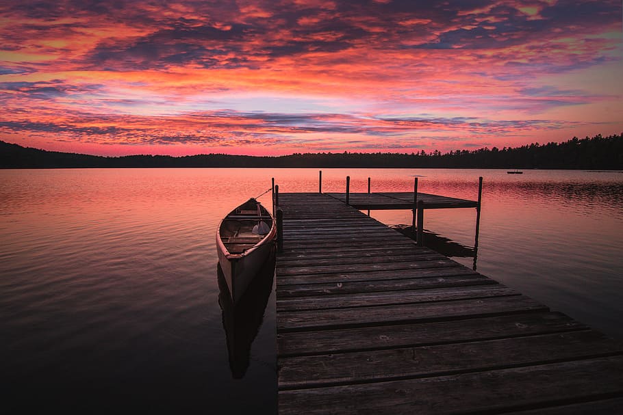 dock bridge beside canoe, lake, pier, boat, sunset, sunrise, orange
