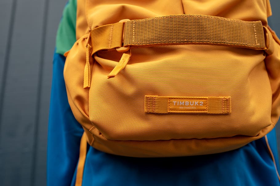 Close-up Photo of Orange Timbuk2 Backpack on Persons Back, bookbag HD wallpaper