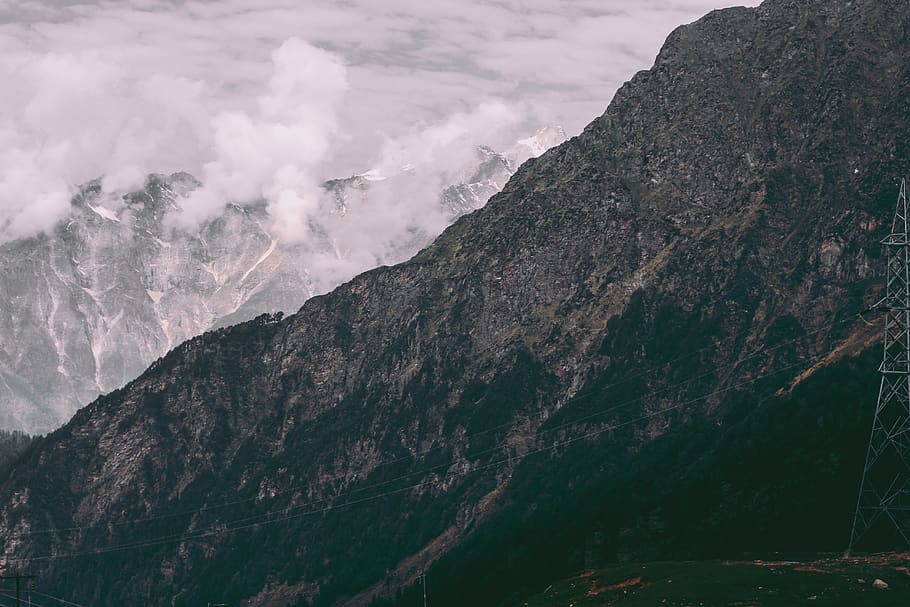 Gray Transmission Tower, cliffs, clouds, daylight, daytime, environment HD wallpaper