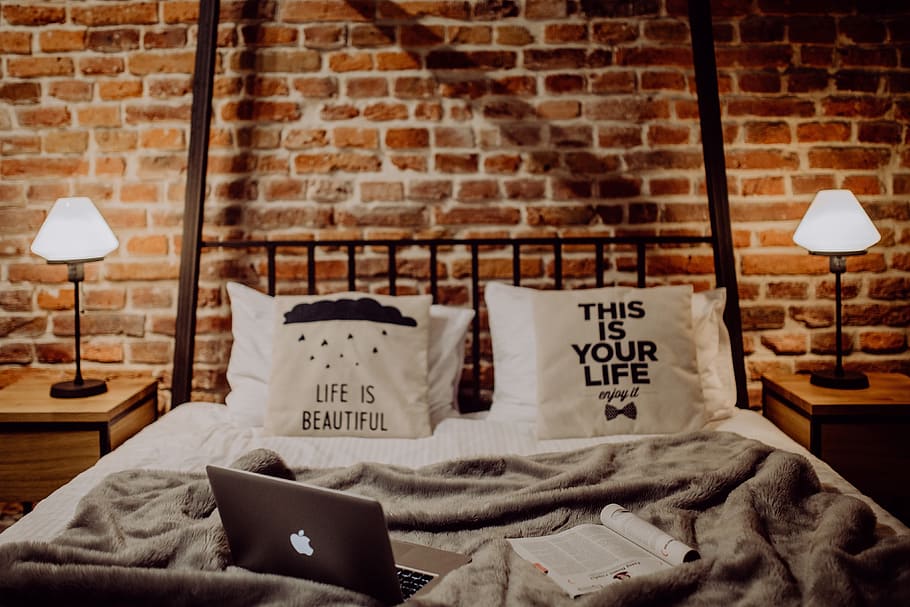 Enjoying evening with a Macbook in a nice bed, home, loft, brick wall, HD wallpaper
