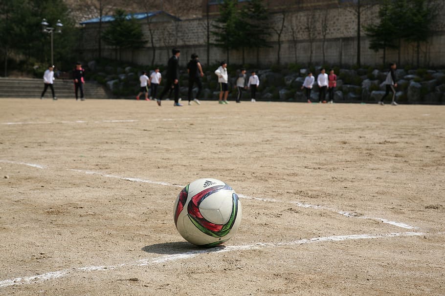 White Red and Green Ball Near Group of People Playing Soccer HD wallpaper