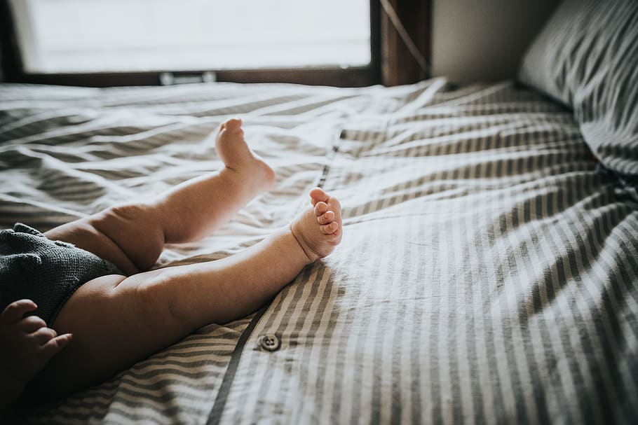 baby lying on sofa, bed, furniture, indoors, low section, home interior HD wallpaper