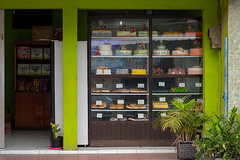 cakes displayed on window display rack, shelf, indonesia, jl girilaya HD wallpaper