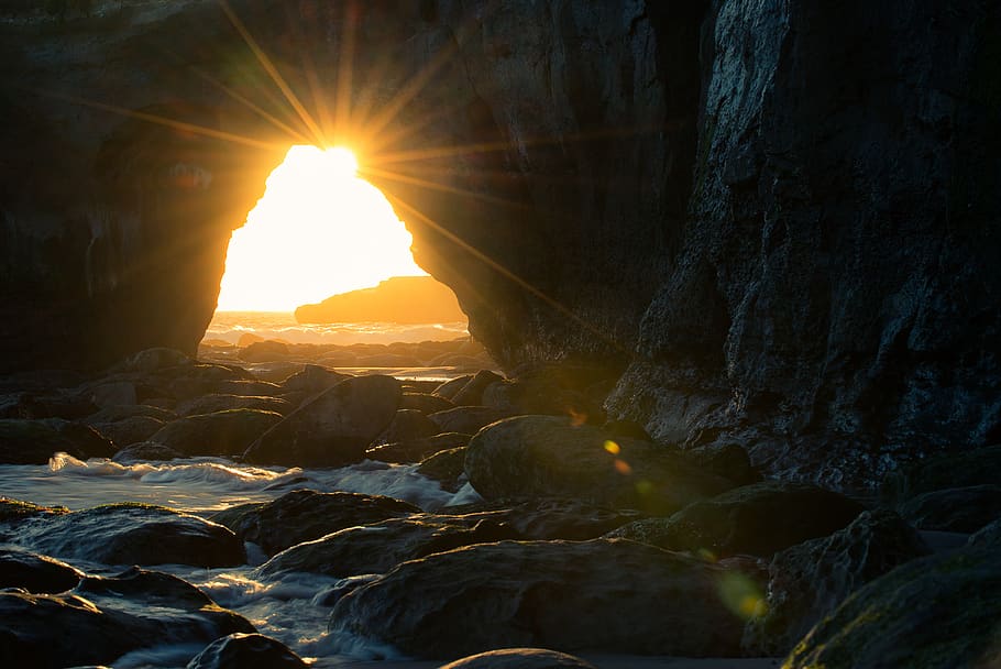 Cave Near Body of Water at Sunset, backlit, beach, clouds, daylight HD wallpaper
