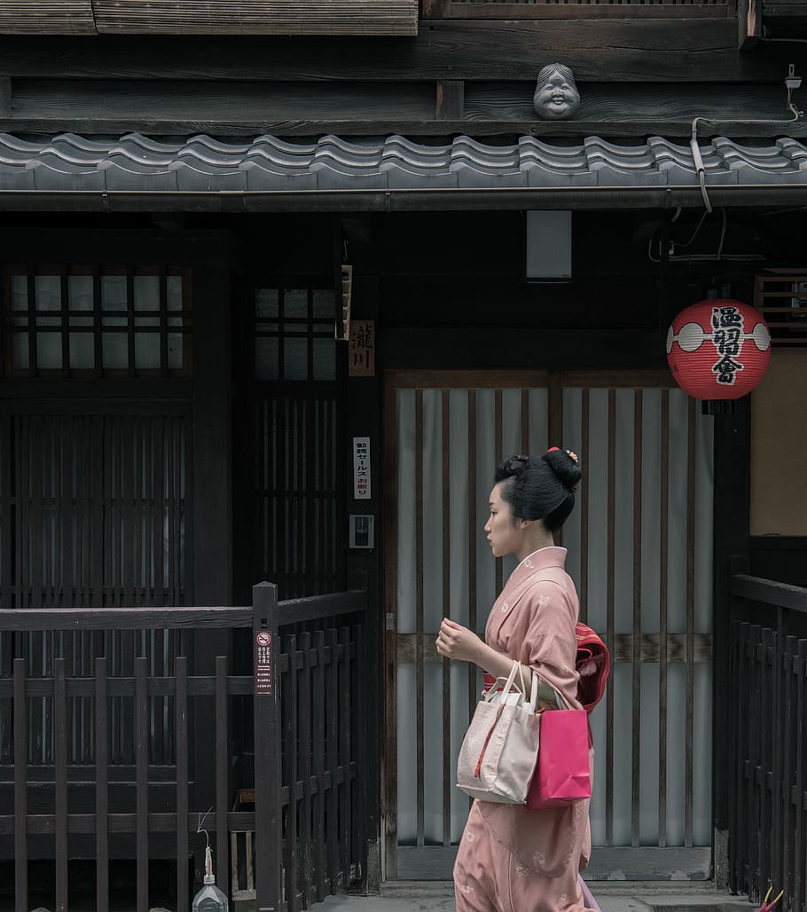 Woman Wearing Pink Kimono Walking Near Houses, bags, daylight