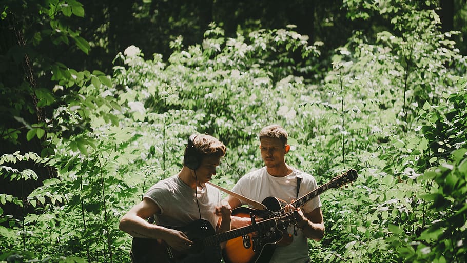 two men playing guitar, person, human, people, musician, forest HD wallpaper