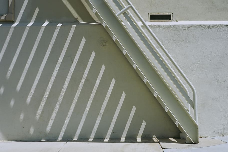 white stairwell casting shadow on ground below, architecture HD wallpaper