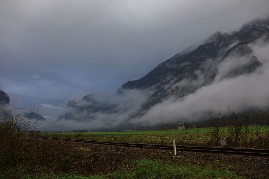 Snow Covered Mountain With Fogs, clouds, dark, dark clouds, dawn HD wallpaper
