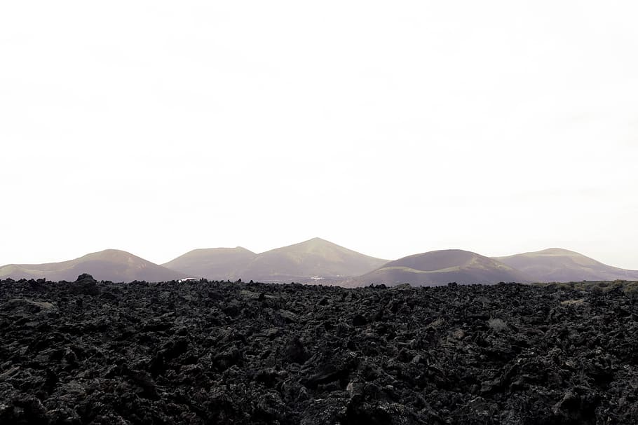 mountain pass and white sky during daytime, lanzarote, spain HD wallpaper