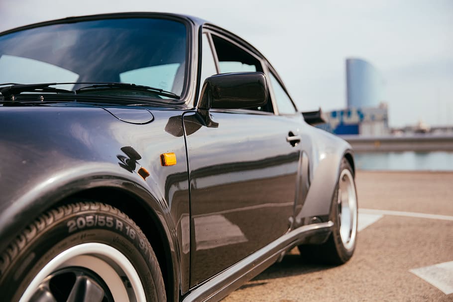 Side view of a black sports car with single door, Bumper, Chrome HD wallpaper