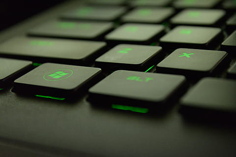 Close-up Photography of Black and Green Computer Keyboard Keys HD wallpaper