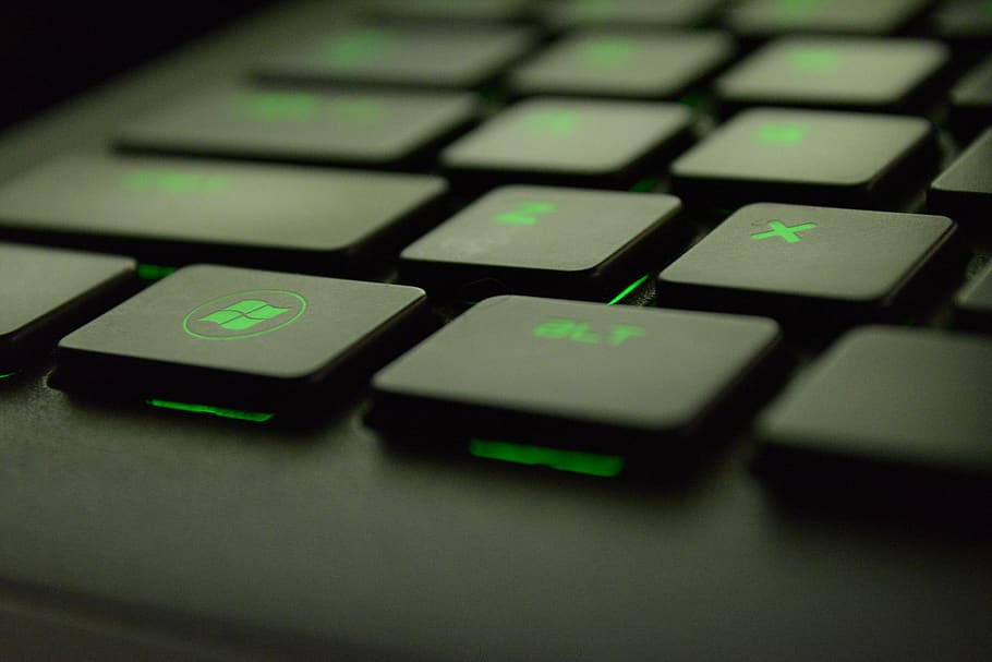 Close-up Photography of Black and Green Computer Keyboard Keys HD wallpaper