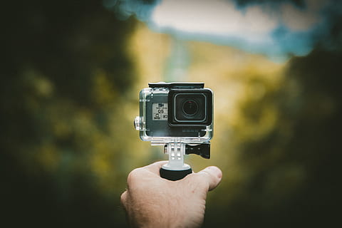 person holding action camera, hand, jamaica, electronics, gopro HD wallpaper