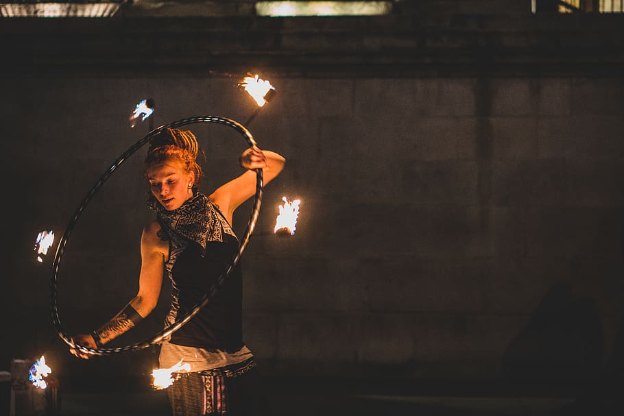 woman playing fire dance, one person, indoors, illuminated, front view HD wallpaper
