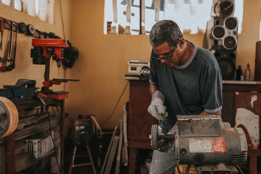 Man Using Bench Grinder, adult, artisan, blacksmith, craft, employee