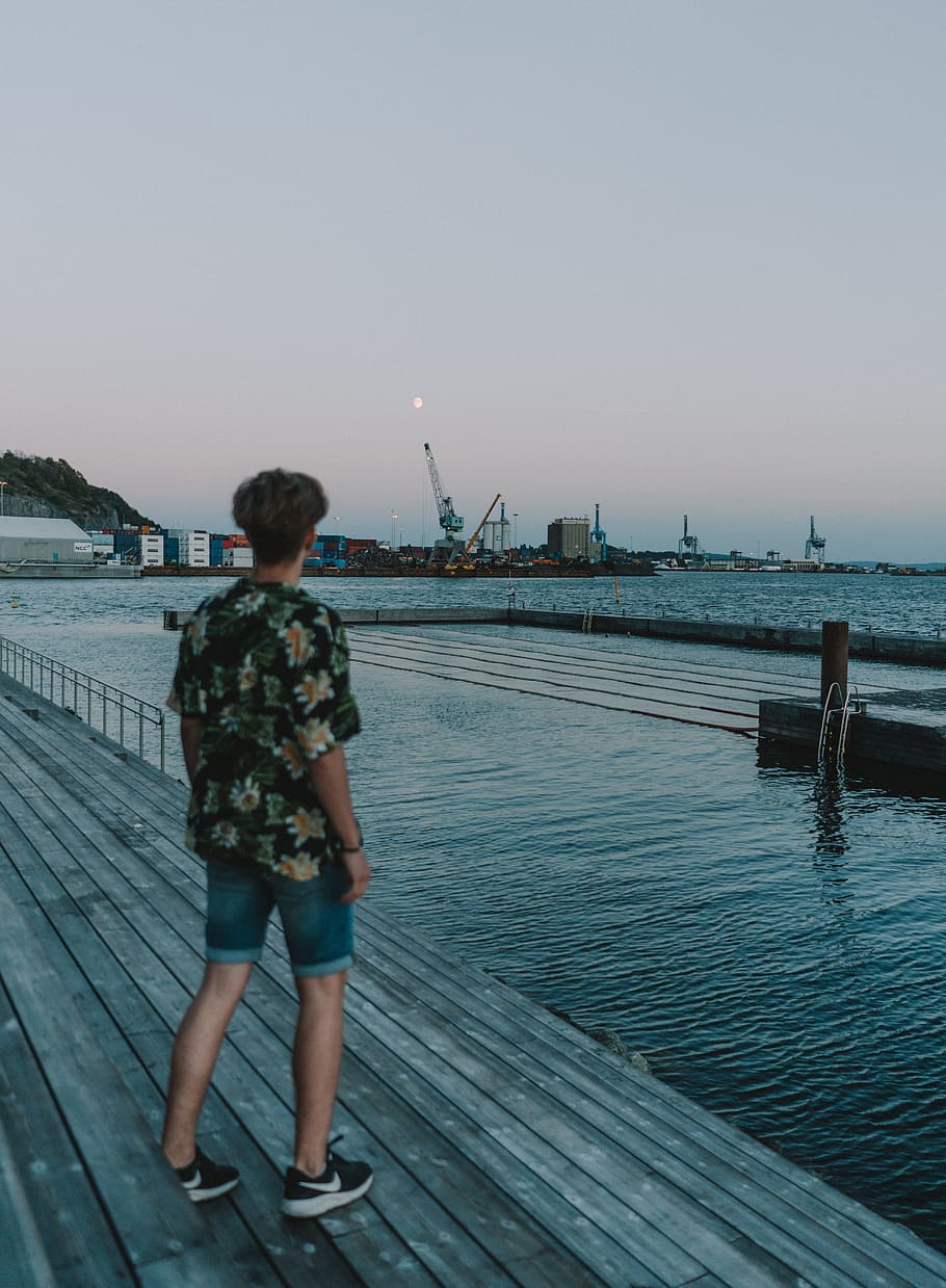 man standing on dock near sea, pier, water, view, moon, evening HD wallpaper