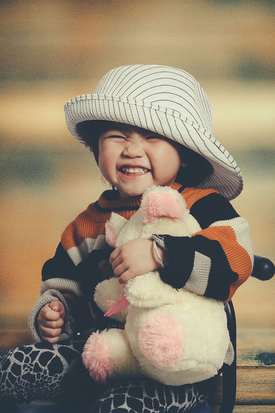 toddler hugging push toy, childhood, hat, clothing, real people HD wallpaper