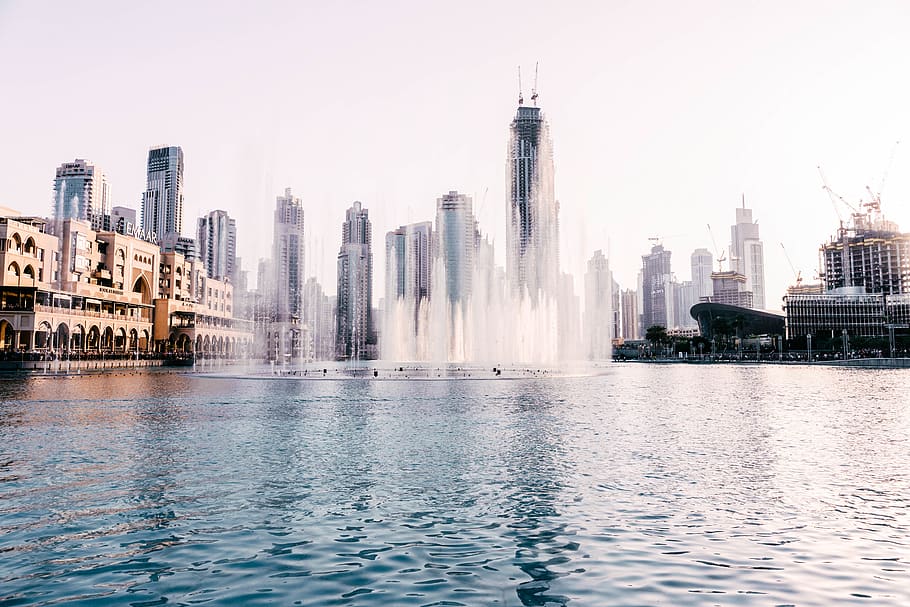 body of water near building during daytime, town, urban, city
