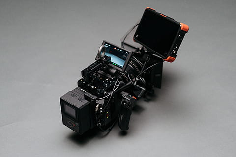 black video camera on gray surface, electronics, display, light HD wallpaper