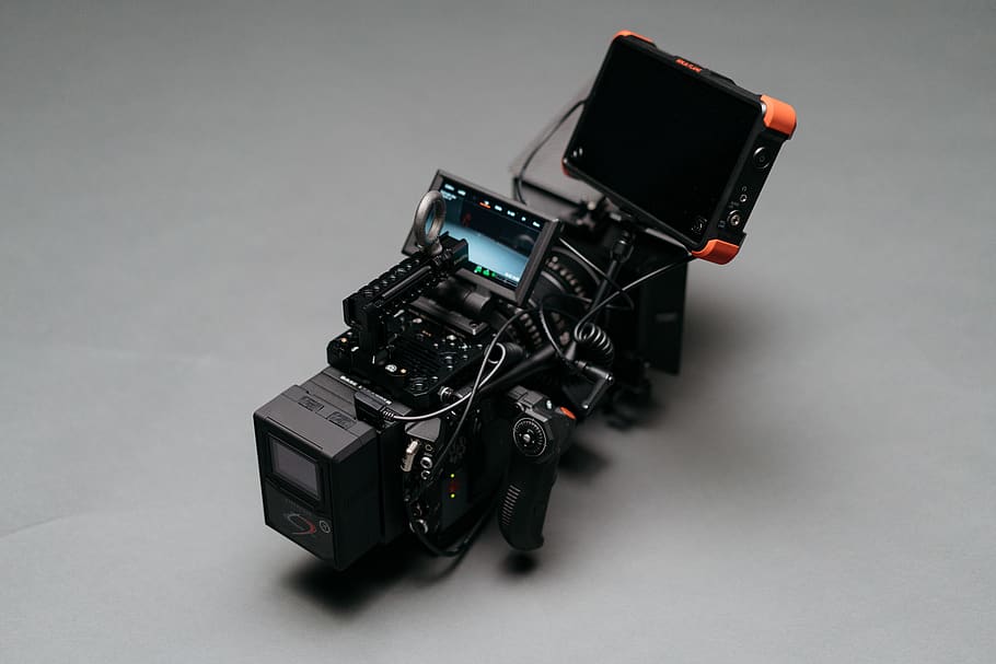 black video camera on gray surface, electronics, display, light HD wallpaper