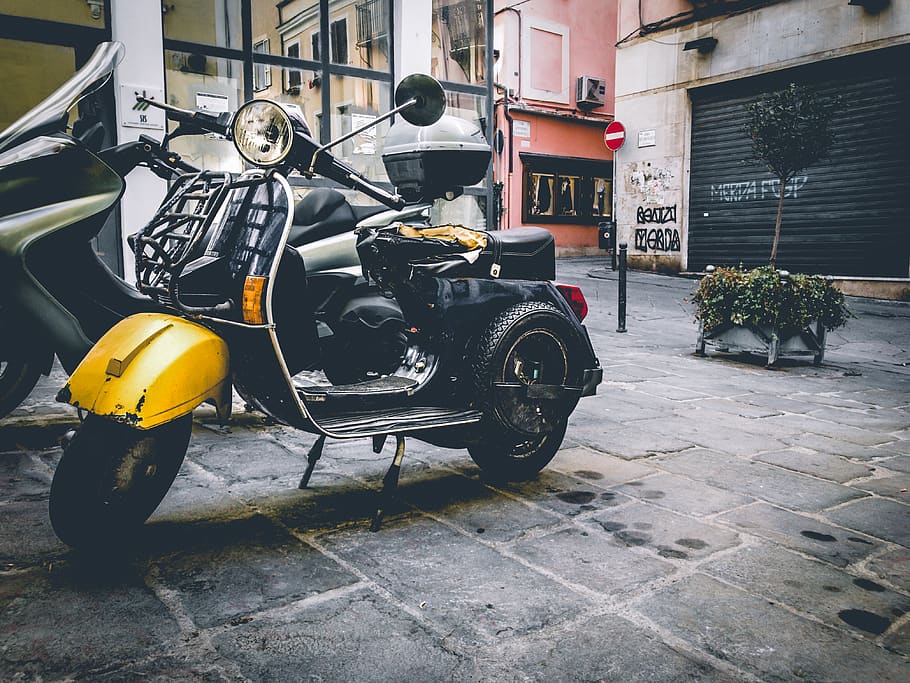 Helmet on the Footrest of Motor Scooter, buildings, city, daylight HD wallpaper