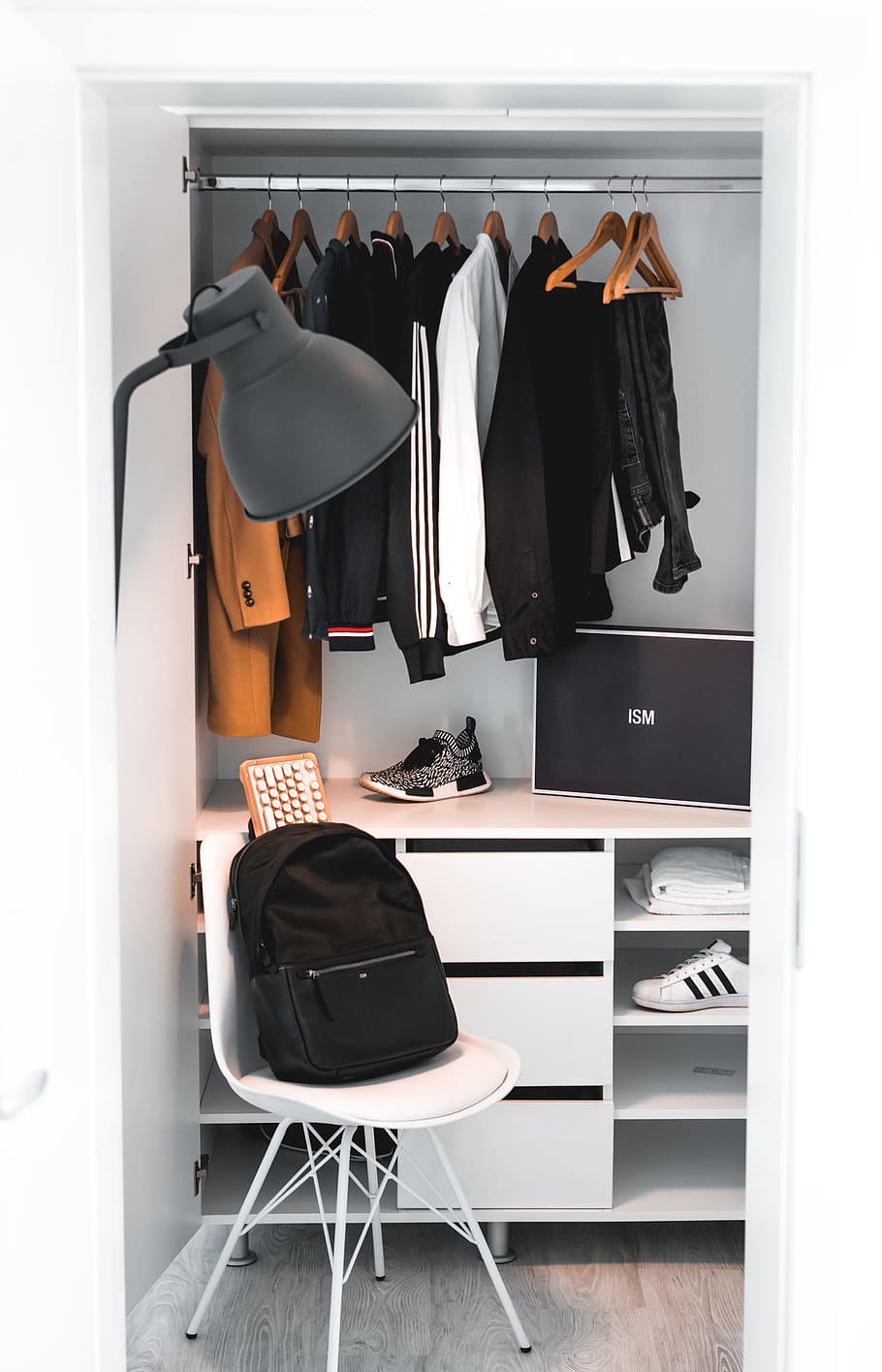black backpack on white chair beside cabinet, lamp, clothes, fashion HD wallpaper