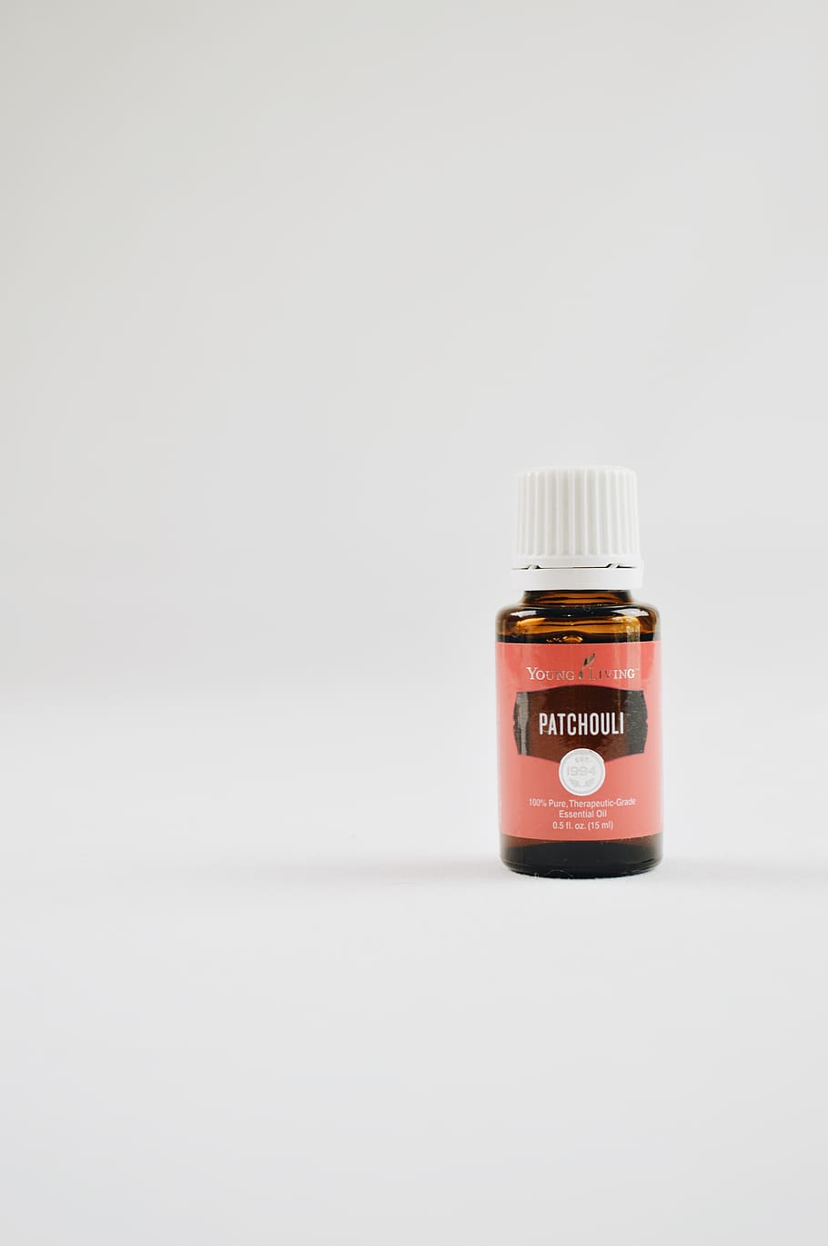 Young Living Patchouili bottle, cosmetics, aftershave, minimal HD wallpaper