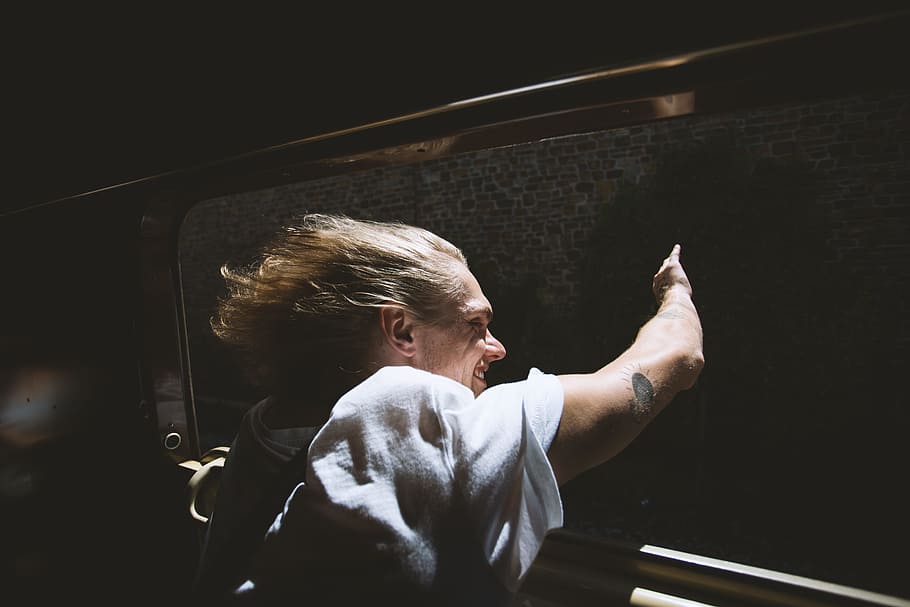man wearing white top, person, window, train, fast, travel, light HD wallpaper