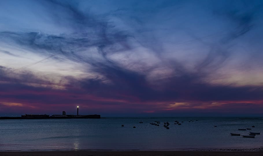 spain, cádiz, ocean, lighthouse, clouds, sky, sea, cloud - sky HD wallpaper