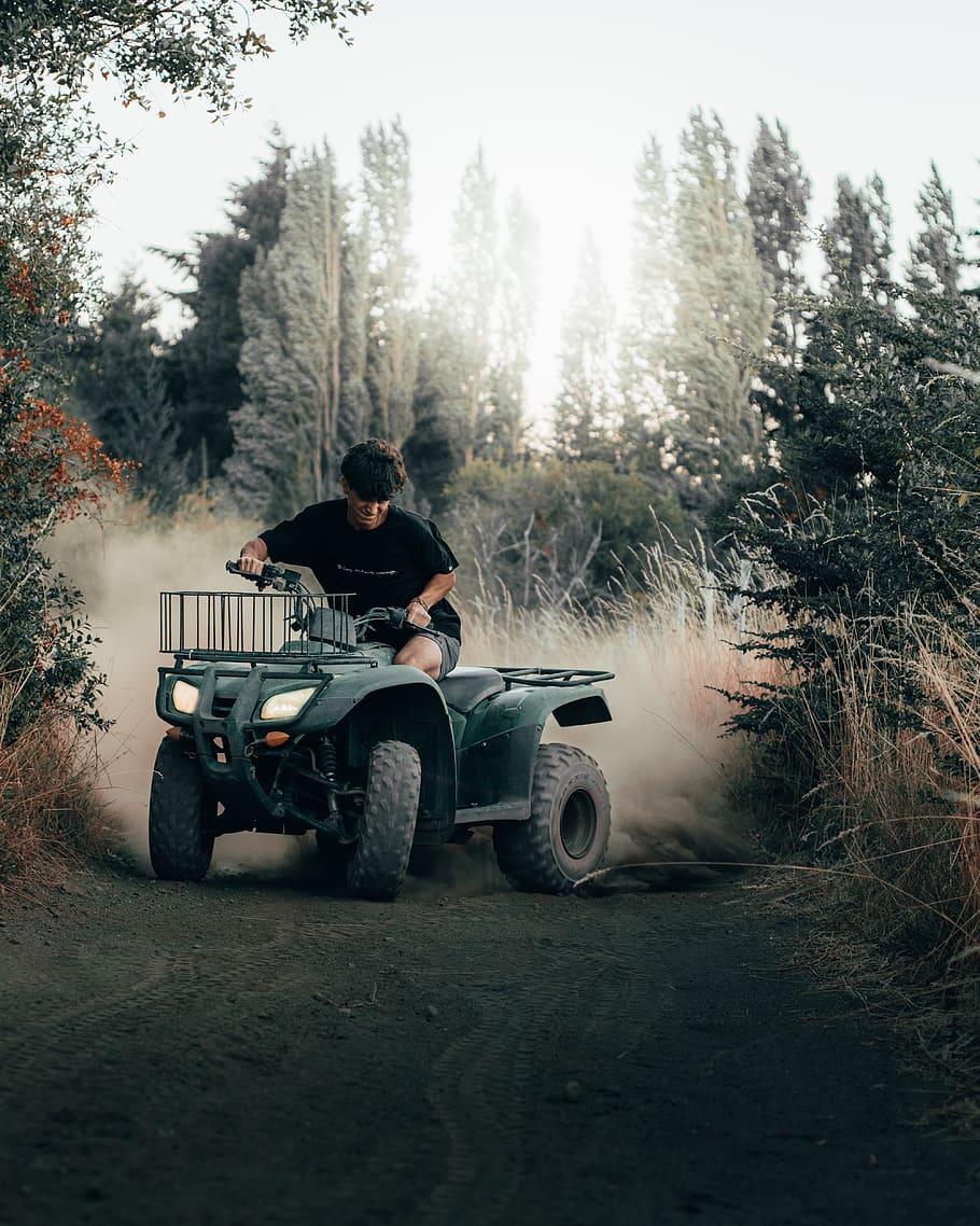 man driving ATV, person, human, wheel, machine, transportation HD wallpaper